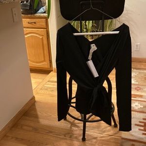 Fabletics Small black wrap top for going from work out to a night out!